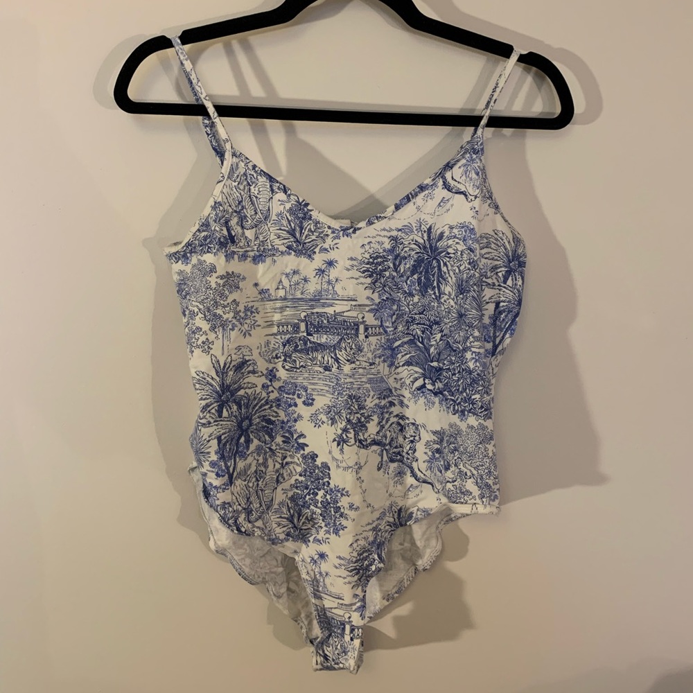Blue and white patterned bodysuit